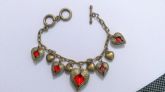 Pulseira com Corações Alados